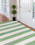 Tassel Trail Collection Area Rug - Pathway (Green and Ivory)